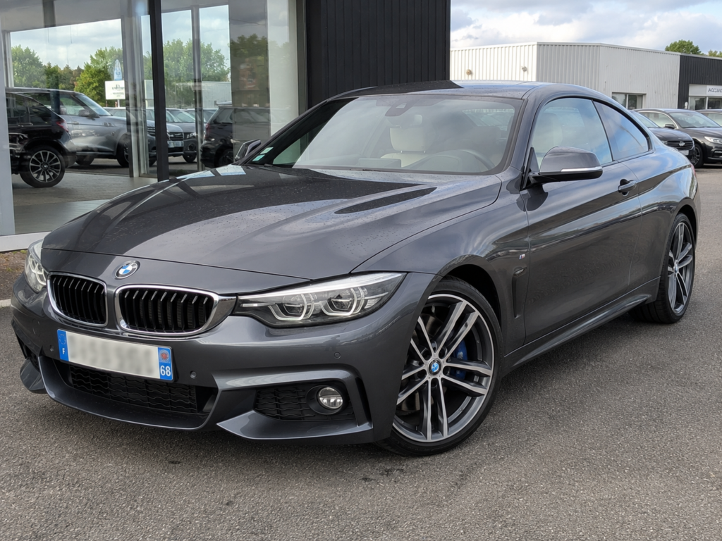 BMW Série 4 Coupé 2018 d'occasion à vendre, véhicule sportif gris en excellent état avec plaque d'immatriculation floutée sur le parc automobile SV Automobile.
