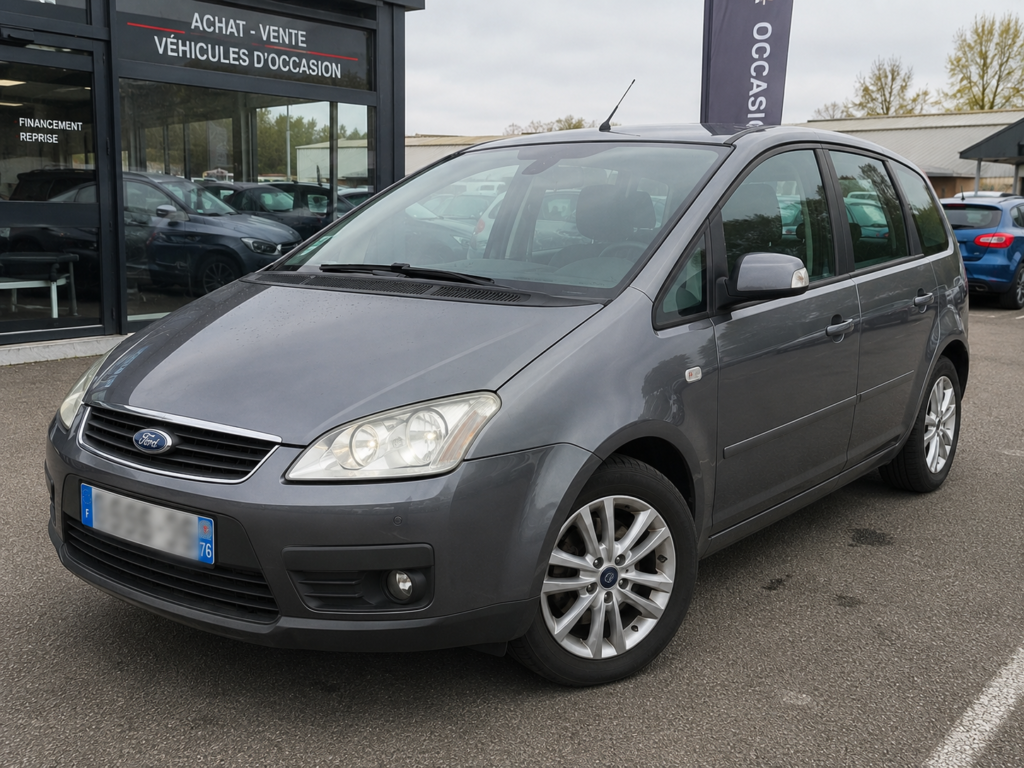 Ford Focus C-Max d'occasion à vendre, monospace gris en excellent état présenté sur le parc SV Automobile avec plaque d'immatriculation floutée.